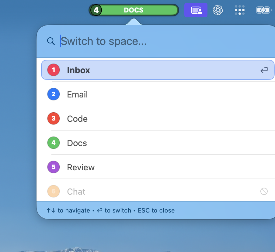 The Quick Switch panel open beneath the green Docs pill, listing Inbox, Email, Code, Docs, Review and a greyed-out Chat, with a 'Switch to space…' search field